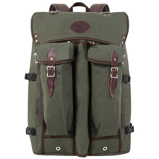 Bushcrafter backpack in rugged olive 15-ounce canvas with leather accents, designed by Duluth Pack for durable outdoor use and dependable performance.