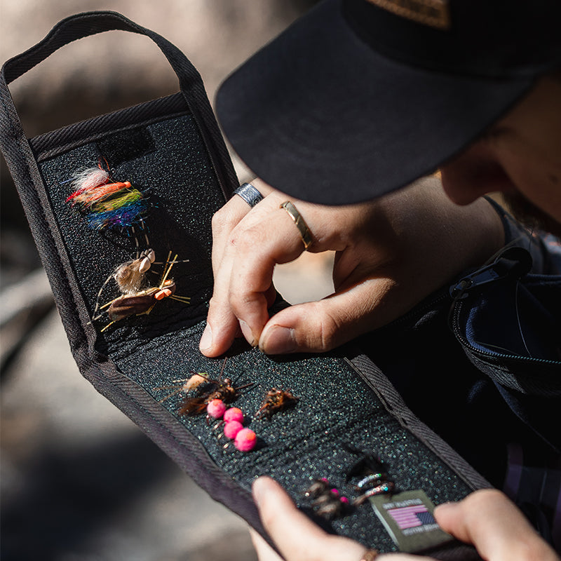 Bi-Fold Fly Wallet in Waxed Olive Drab that's open while fly fishing