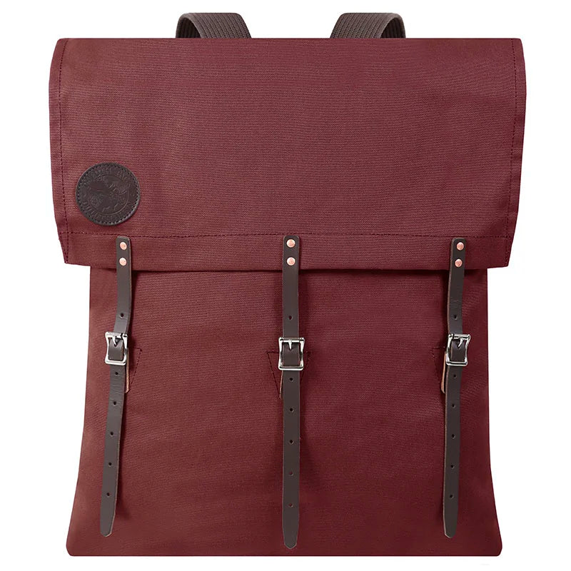 #60 Utility Pack - 42 L in burgundy canvas with leather straps, handcrafted for durable outdoor use and rugged adventures by Duluth Pack.