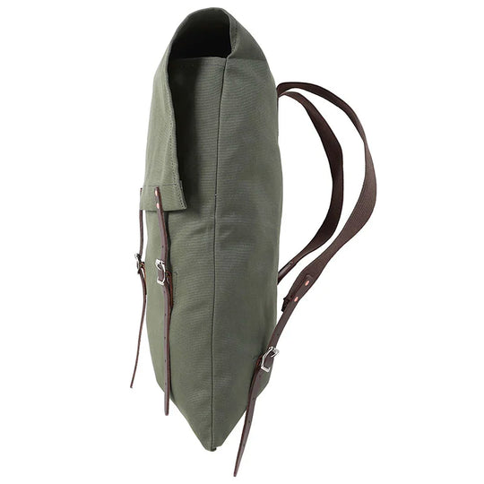 #60 Utility Pack - 42 L in Waxed Olive Drab canvas with reinforced cotton shoulder straps, showcasing durable outdoor craftsmanship by Duluth Pack in a side profile view.
